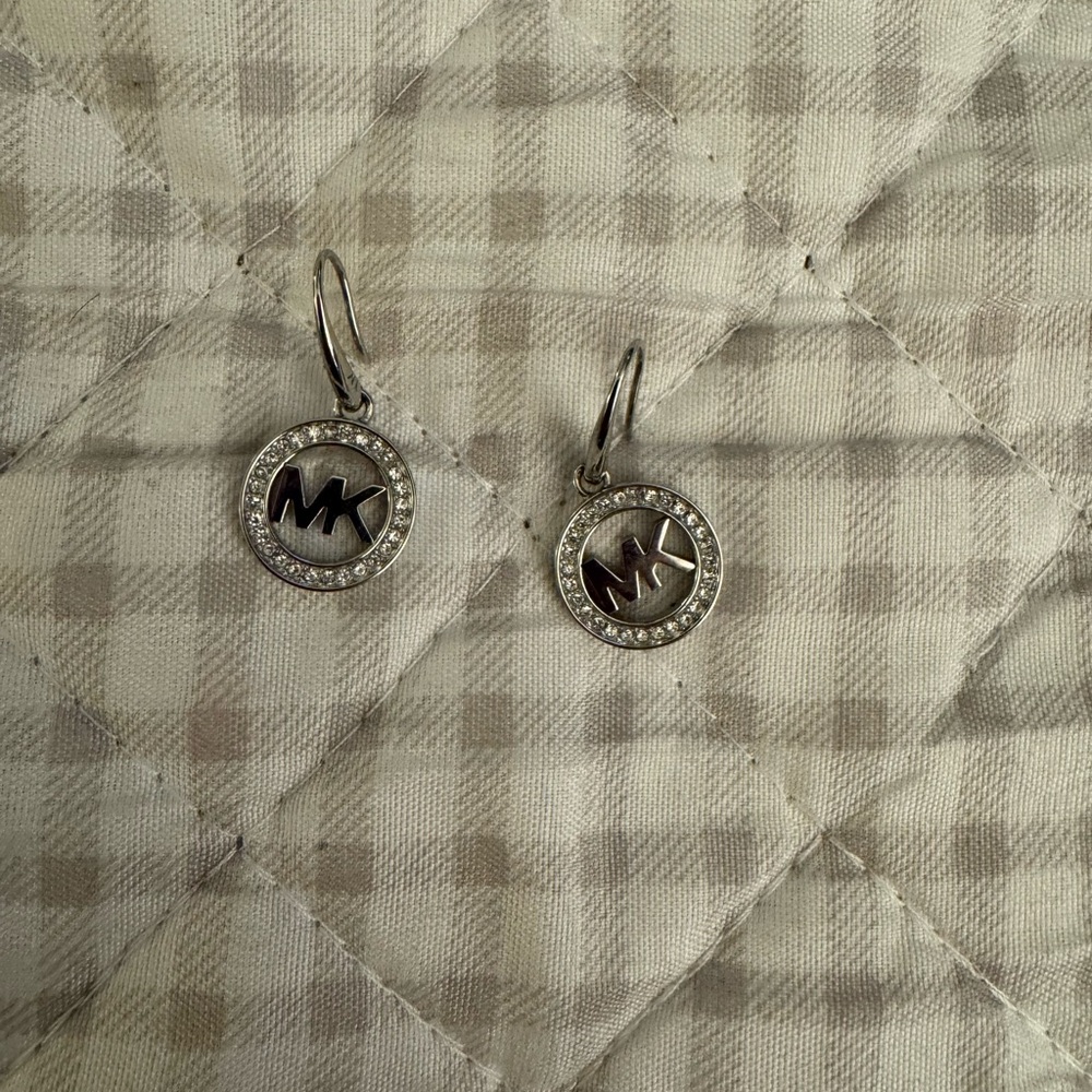 Michael Kors silver earrings.